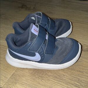Baby girl purple Nike tennis shoes Star Runner